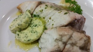 Baked fish and herb butter